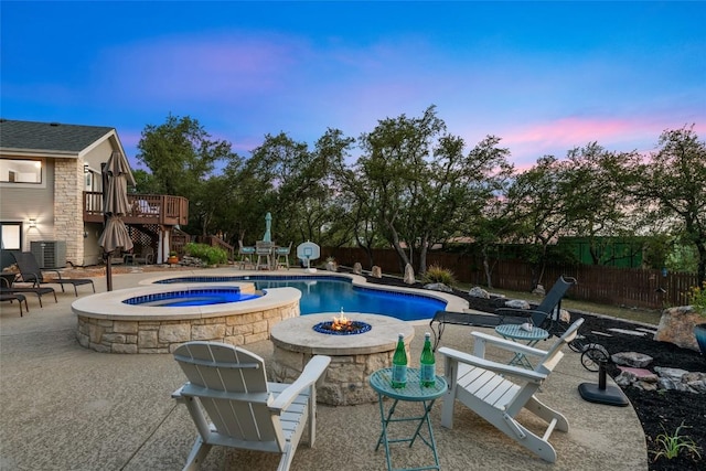 4500 Poteau Cir, Austin, TX 78734 - view of pool featuring a fire pit, stairway, a wooden deck, a patio area, and a fenced backyard