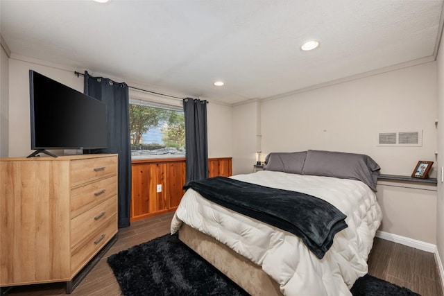 4500 Poteau Cir, Austin, TX 78734 - bedroom featuring dark wood-type flooring, recessed lighting, and wainscoting