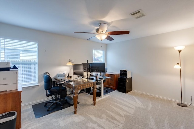 1312 Kothman Dr, Hutto, TX 78634 - office area featuring a ceiling fan and light carpet