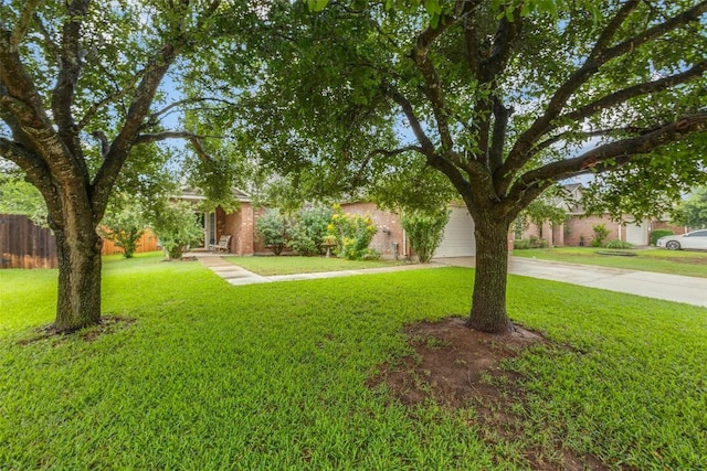 1312 Kothman Dr, Hutto, TX 78634 - obstructed view of property with concrete driveway