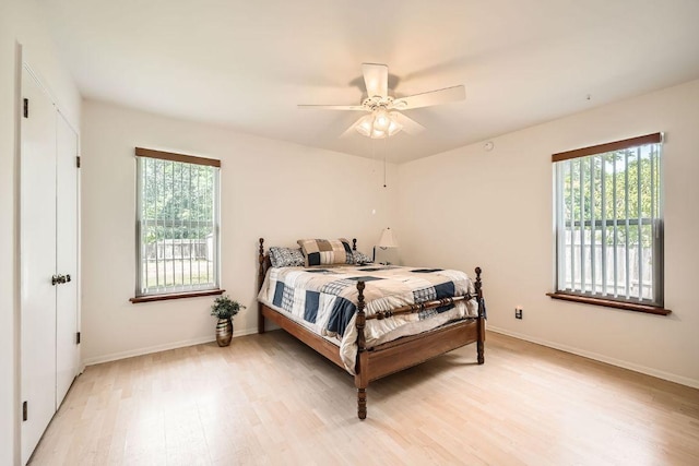 914 Hermitage Dr, Austin, TX 78753 - bedroom with light wood-style floors and a ceiling fan