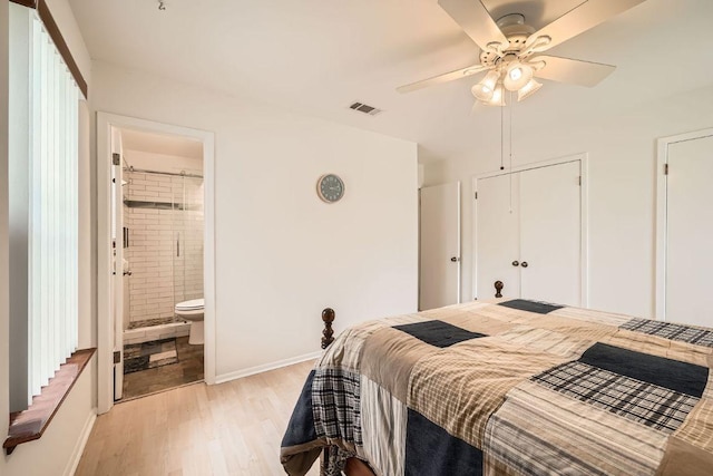 914 Hermitage Dr, Austin, TX 78753 - bedroom featuring light wood finished floors, ensuite bathroom, and ceiling fan
