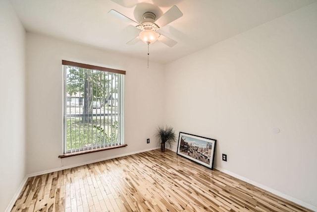 914 Hermitage Dr, Austin, TX 78753 - spare room featuring wood-type flooring and a ceiling fan