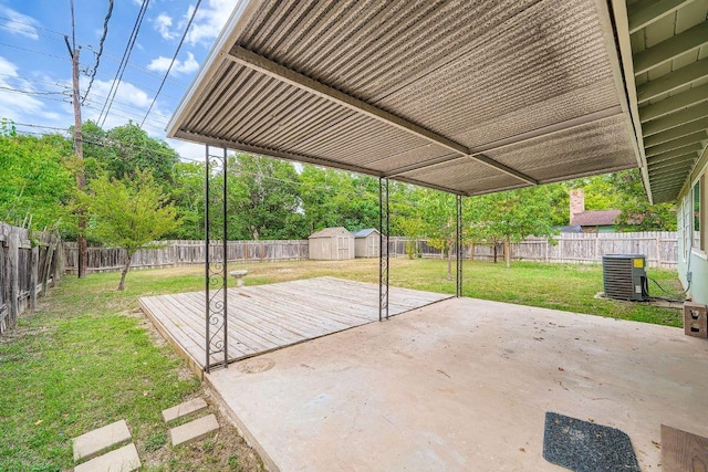 914 Hermitage Dr, Austin, TX 78753 - fenced backyard with a patio and a storage shed