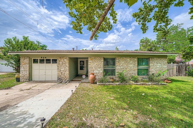 914 Hermitage Dr, Austin, TX 78753 - ranch-style house featuring stone siding, a garage, and driveway