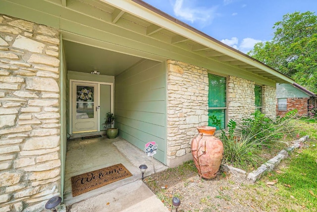 914 Hermitage Dr, Austin, TX 78753 - view of exterior entry with stone siding