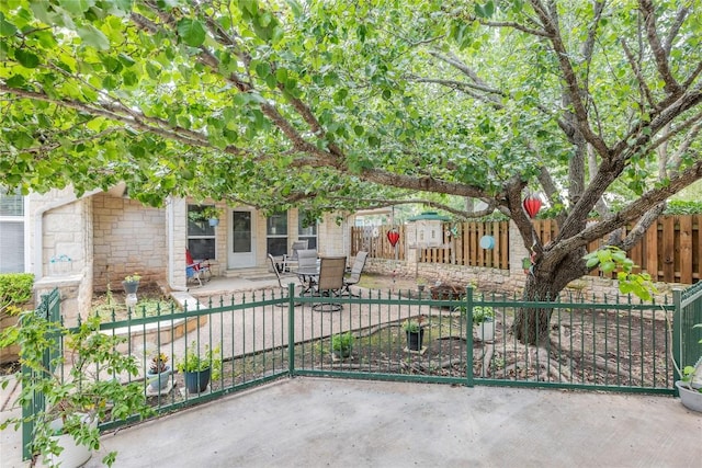 500 N Main St N, Burnet, TX 78611 - view of front of house featuring a patio and stone siding