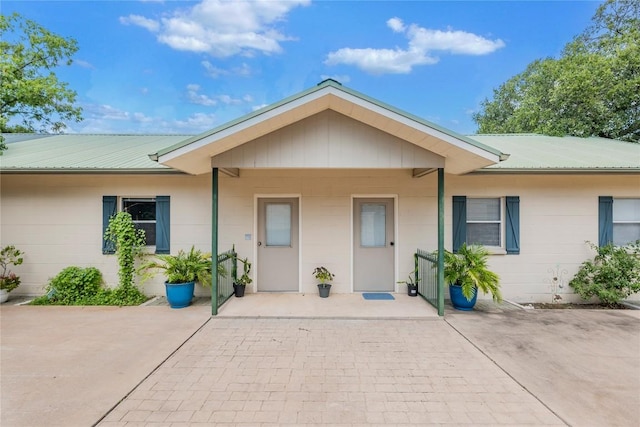 500 N Main St N, Burnet, TX 78611 - ranch-style house with a metal roof and concrete block siding