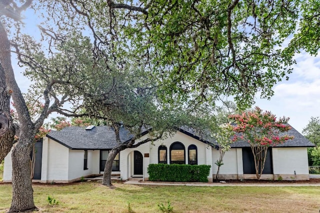 8401 Persimmon Grv, Austin, TX 78737 - view of front of property featuring a front lawn, roof with shingles, and a garage