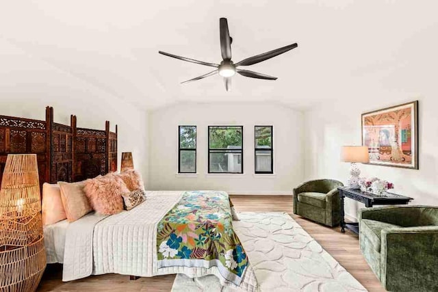 8401 Persimmon Grv, Austin, TX 78737 - bedroom featuring wood finished floors, vaulted ceiling, and ceiling fan