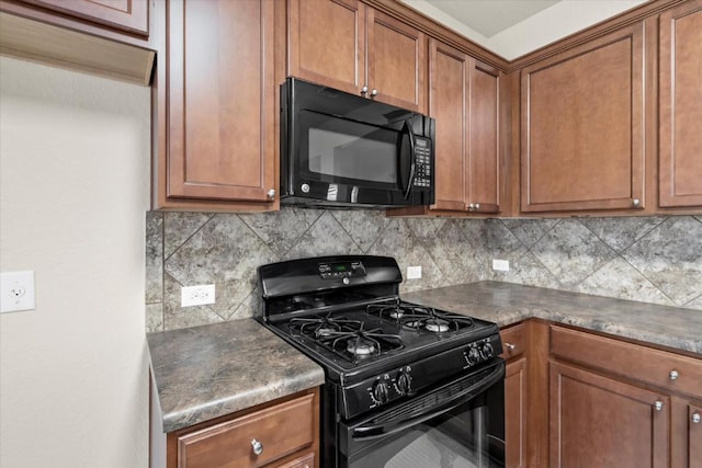 121 Brazoria Trl, San Marcos, TX 78666 - kitchen featuring black appliances, backsplash, and brown cabinetry
