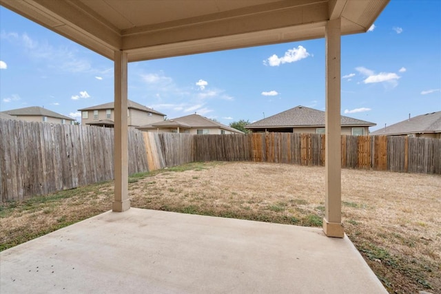 121 Brazoria Trl, San Marcos, TX 78666 - fenced backyard with a patio
