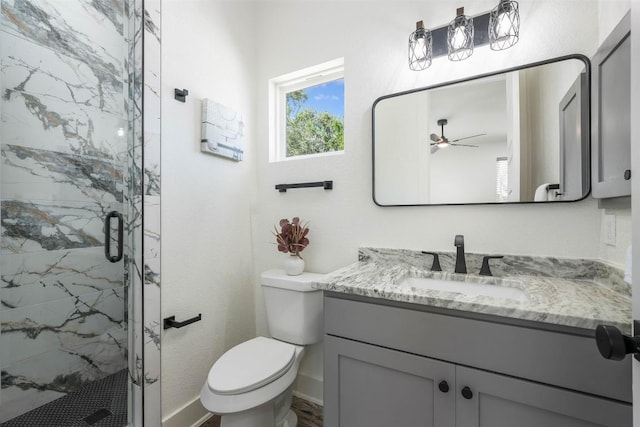 1156 Timberlane Dr, Canyon Lake, TX 78133 - full bathroom with vanity, a marble finish shower, and a ceiling fan