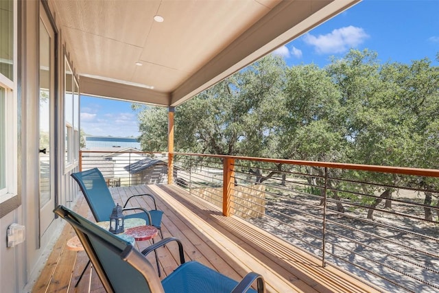 1156 Timberlane Dr, Canyon Lake, TX 78133 - wooden terrace with a water view