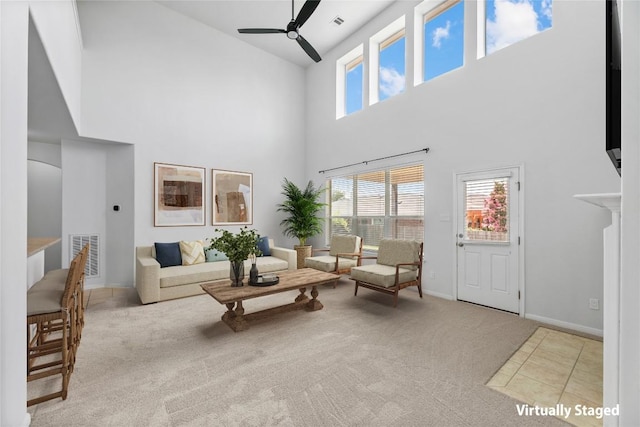 18609 Sandy Bottom Dr, Pflugerville, TX 78660 - living area featuring a high ceiling, ceiling fan, and carpet
