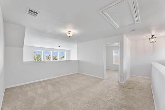 18609 Sandy Bottom Dr, Pflugerville, TX 78660 - carpeted spare room with attic access and plenty of natural light