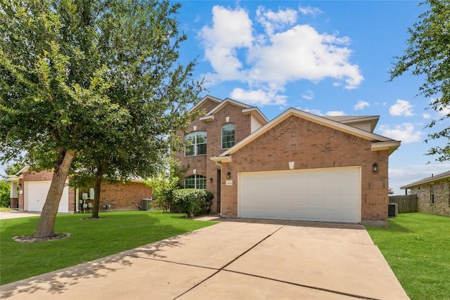 18609 Sandy Bottom Dr, Pflugerville, TX 78660 - traditional-style house featuring brick siding, a front lawn, and concrete driveway