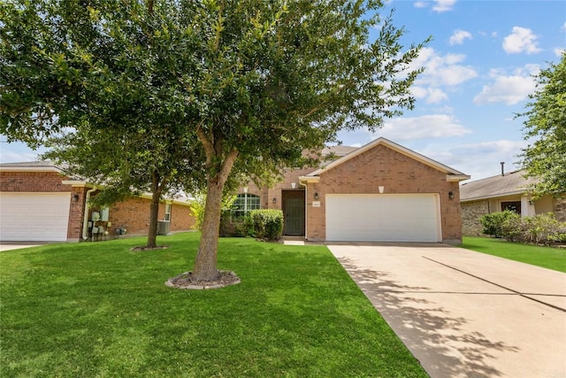 18609 Sandy Bottom Dr, Pflugerville, TX 78660 - view of front of house featuring brick siding, a front yard, a garage, and concrete driveway
