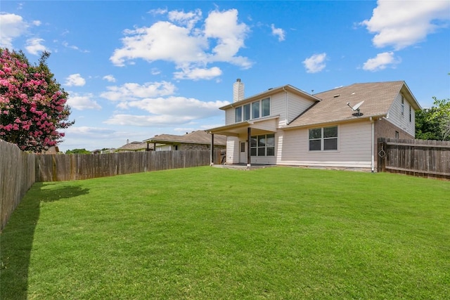 18609 Sandy Bottom Dr, Pflugerville, TX 78660 - rear view of property with a chimney and a fenced backyard