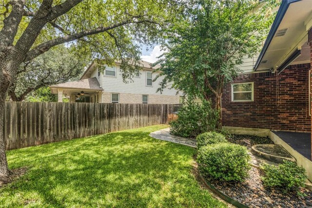 14504 Templemore Cv, Austin, TX 78717 - fenced yard featuring ceiling fan