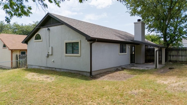 109 Campfire Cir, Copperas Cove, TX 76522 - rear view of house with a chimney and a shingled roof