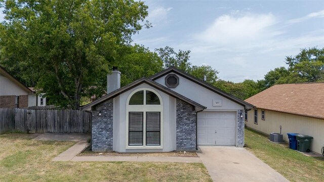109 Campfire Cir, Copperas Cove, TX 76522 - view of front facade featuring a chimney, an attached garage, driveway, and stucco siding
