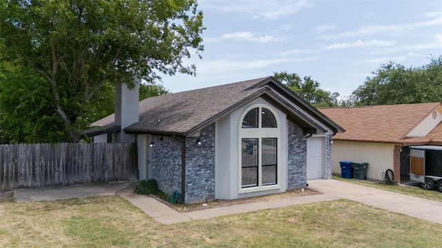 109 Campfire Cir, Copperas Cove, TX 76522 - view of side of home featuring a shingled roof, driveway, a chimney, and stone siding