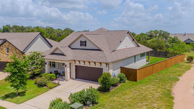 716 Dayridge Dr, Dripping Springs, TX 78620 - view of front facade featuring stone siding, driveway, and a shingled roof