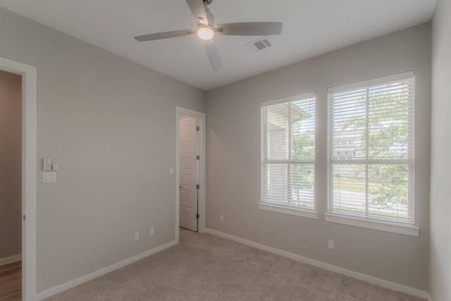716 Dayridge Dr, Dripping Springs, TX 78620 - spare room with plenty of natural light, ceiling fan, and carpet flooring