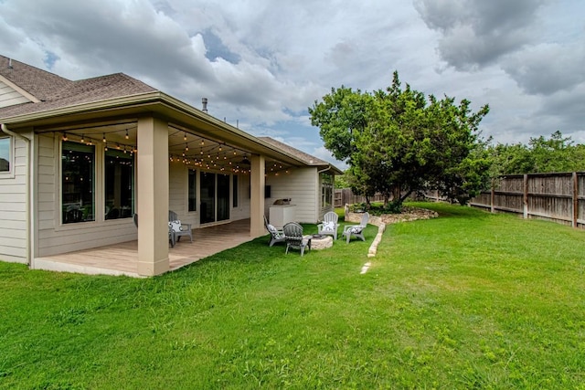 716 Dayridge Dr, Dripping Springs, TX 78620 - rear view of house with a fenced backyard, a patio area, a shingled roof, and an outdoor fire pit