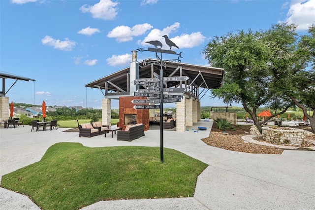 716 Dayridge Dr, Dripping Springs, TX 78620 - surrounding community featuring an outdoor hangout area, a patio, and a yard
