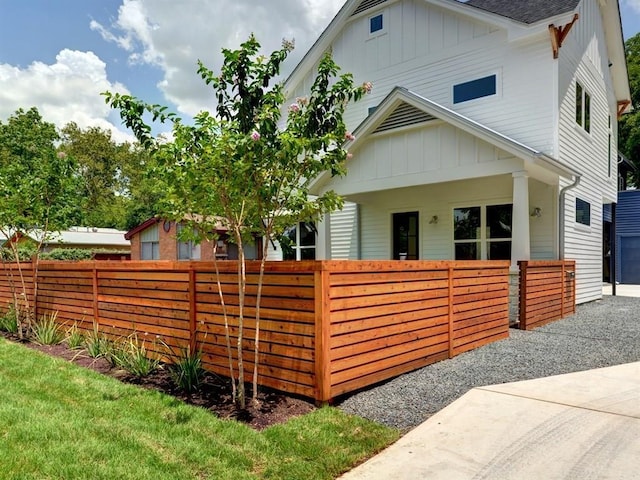 4525 Ave H Unit A, Austin, TX 78751 - view of front of home featuring board and batten siding and roof with shingles