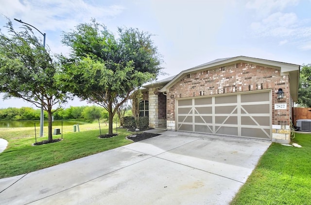 7822 Harvest Bay, San Antonio, TX 78253 - view of front of house with brick siding, a garage, a front lawn, and driveway