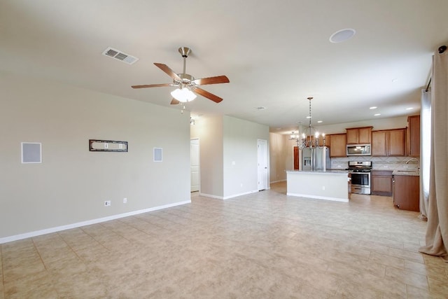 7822 Harvest Bay, San Antonio, TX 78253 - unfurnished living room with a ceiling fan, a chandelier, and recessed lighting