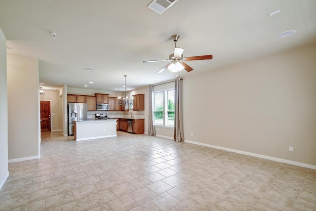 7822 Harvest Bay, San Antonio, TX 78253 - unfurnished living room featuring a ceiling fan, recessed lighting, and a chandelier