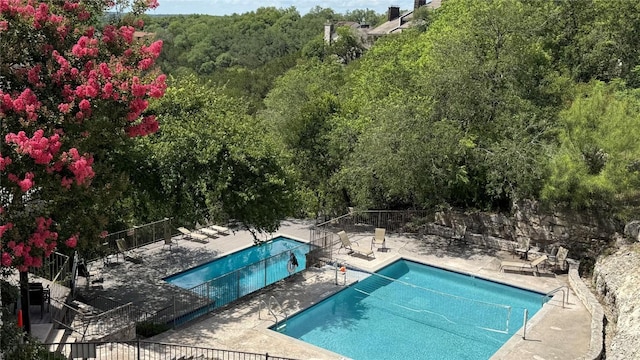 8200 Neely Dr Unit 160, Austin, TX 78759 - community pool with a patio and a wooded view