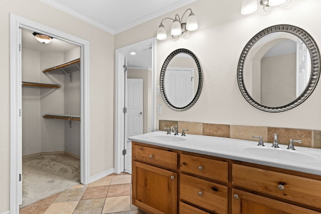 3402 Lauren St, Copperas Cove, TX 76522 - bathroom with double vanity, crown molding, and a walk in closet