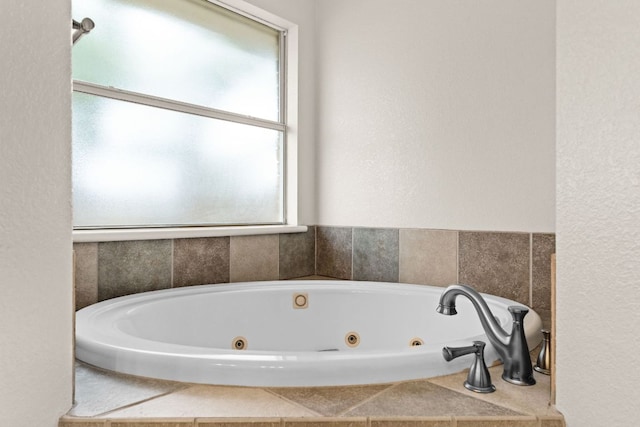 3402 Lauren St, Copperas Cove, TX 76522 - full bathroom with healthy amount of natural light and a jetted tub