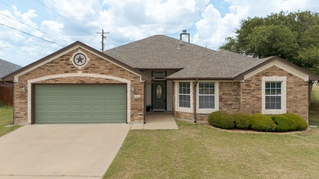 3402 Lauren St, Copperas Cove, TX 76522 - view of front of home featuring brick siding, concrete driveway, a garage, a shingled roof, and a front lawn