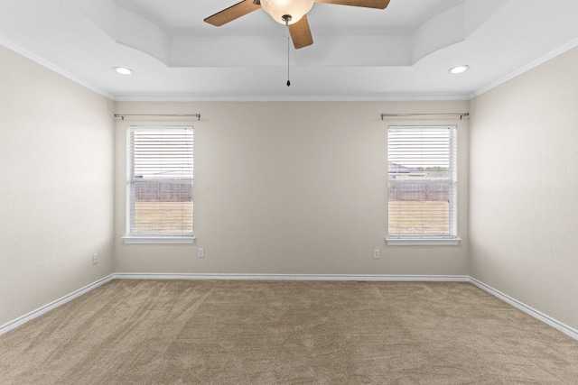 3402 Lauren St, Copperas Cove, TX 76522 - carpeted empty room featuring a tray ceiling, plenty of natural light, a ceiling fan, and recessed lighting
