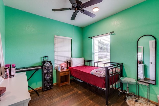 130 Los Arcos Rd, Elgin, TX 78621 - bedroom with wood finished floors and ceiling fan