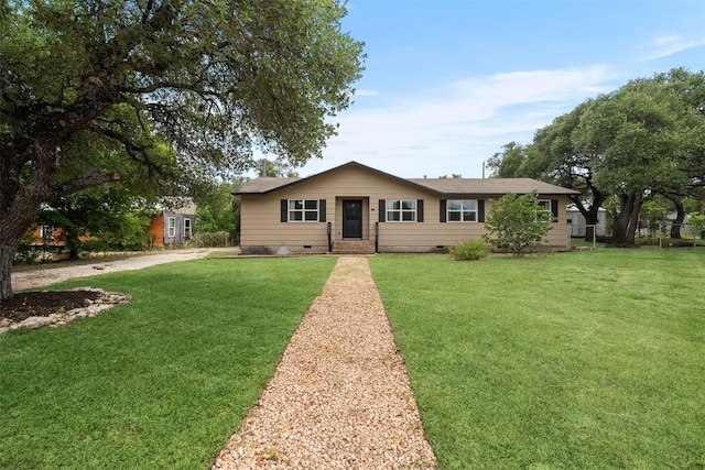 617 Johnson St, Bertram, TX 78605 - single story home with crawl space and a front lawn