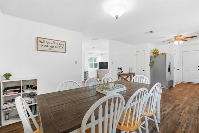 617 Johnson St, Bertram, TX 78605 - dining space featuring dark wood-type flooring and a ceiling fan