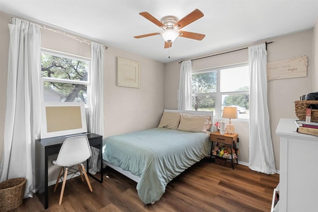 617 Johnson St, Bertram, TX 78605 - bedroom featuring wood finished floors and a ceiling fan