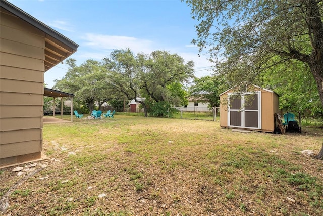 617 Johnson St, Bertram, TX 78605 - view of yard featuring a storage shed