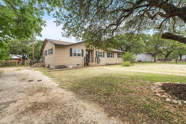 617 Johnson St, Bertram, TX 78605 - ranch-style home featuring crawl space