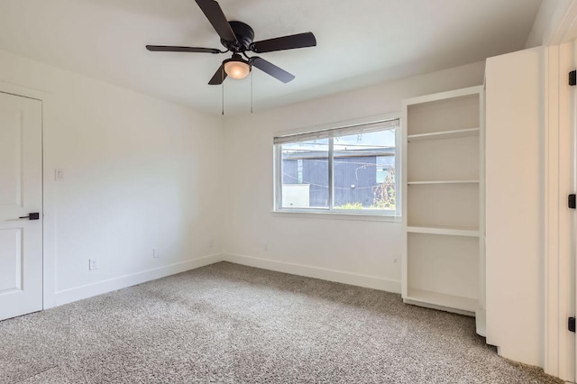 1511 Wilson Heights Dr, Austin, TX 78746 - unfurnished bedroom featuring carpet flooring and ceiling fan