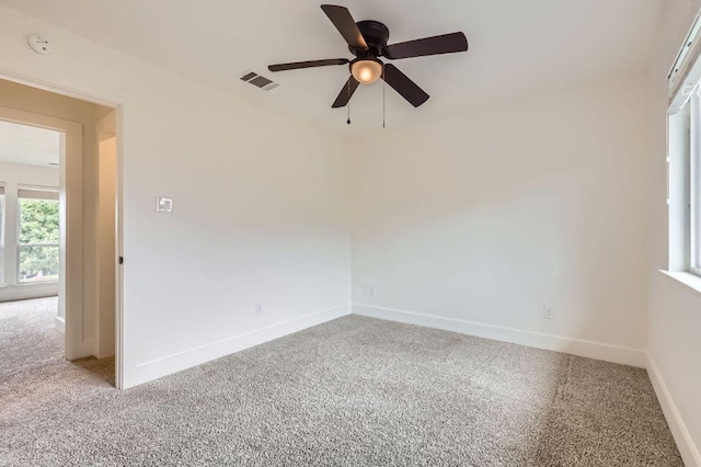 1511 Wilson Heights Dr, Austin, TX 78746 - carpeted spare room with a ceiling fan and a smoke detector