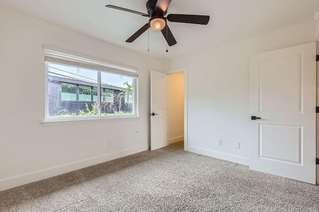 1511 Wilson Heights Dr, Austin, TX 78746 - unfurnished bedroom with carpet floors and a ceiling fan