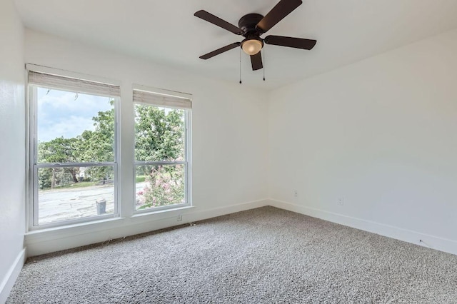 1511 Wilson Heights Dr, Austin, TX 78746 - empty room featuring carpet flooring and a ceiling fan